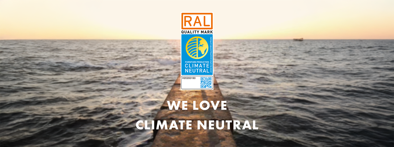 Ocean scene with climate neutrality certificate and the statement We love climate neutral by pronorm