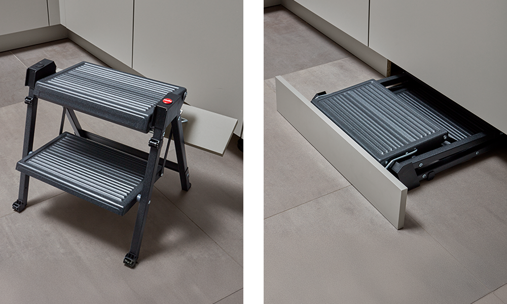 Space-saving step stool integrated into the plinth of a storage room cabinet