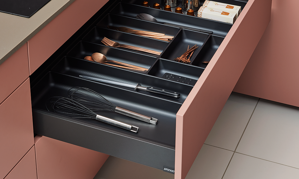 Modern anthracite cutlery insert by pronorm with clean layout and elegant kitchen integration.