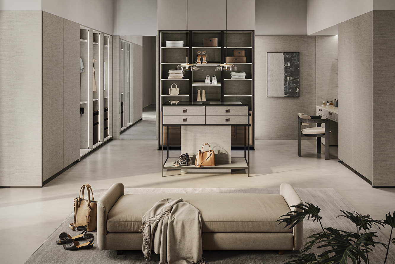 Hochwertige Ankleide mit Leinenoptik, Inselmodul und Schminkbereich – modernes pronorm Design.