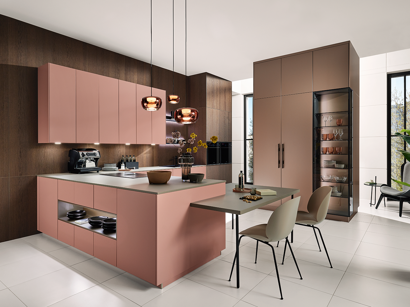 Genieße das exklusive Küchendesign in Rosa von pronorm mit integrierter Esstischlösung und hochwertiger Ausstattung.