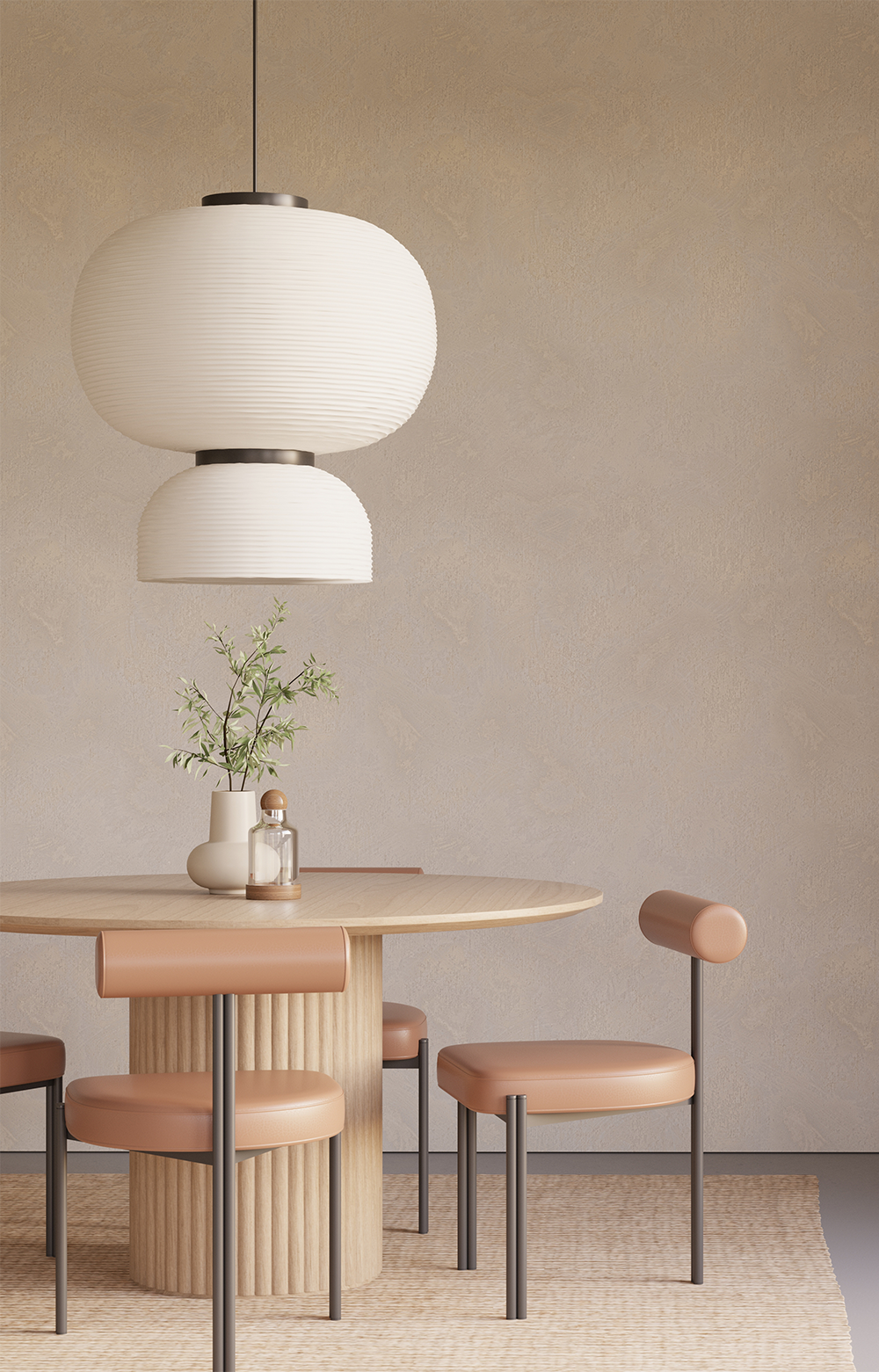 A Japandi-style dining area with a round wooden table and light leather chairs. Above it hangs a Japandi-style lamp with soft, round forms.