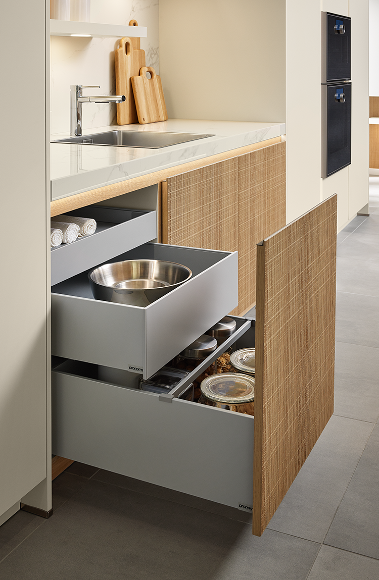 Organised drawer system for structured kitchen storage and efficient drawer organisation