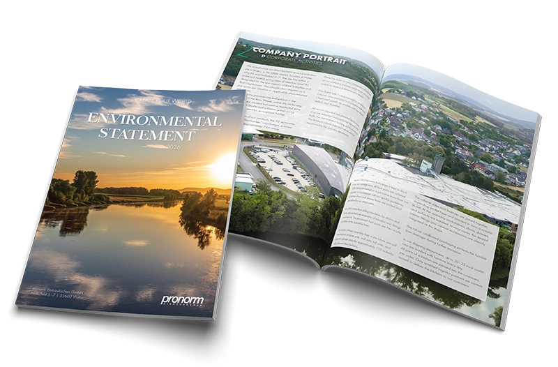 Mockup of the current pronorm Environmental Statement featuring the cover and an open sustainability report with up-to-date company and environmental insights.