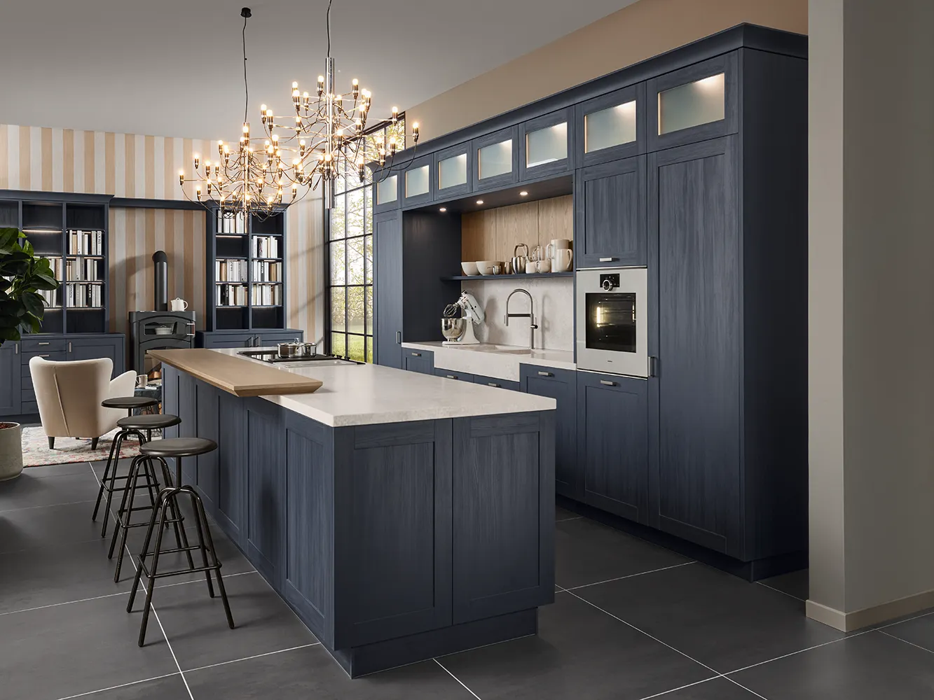 Modern country-style kitchen with blue wood-frame fronts featuring visible grain.