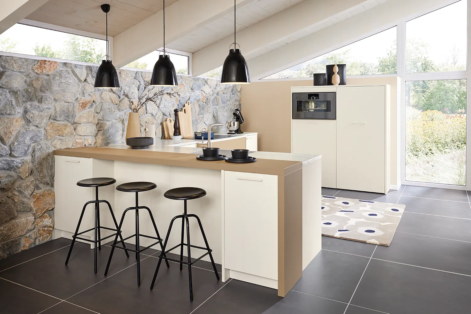Bright pronorm kitchen in beige tones with a kitchen island