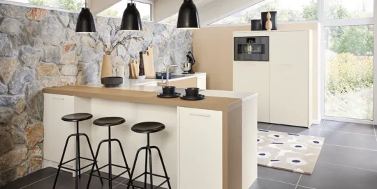 Bright pronorm kitchen in beige tones with a kitchen island